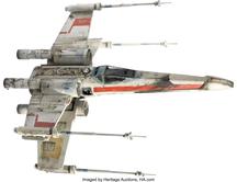 Star Wars' Red Leader X-wing model heads a cargo bay's worth of props at  auction