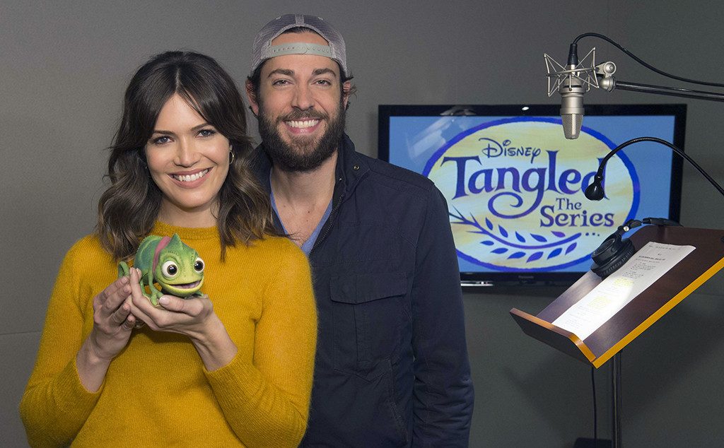 TANGLED - Mandy Moore and Zachary Levi were greeted by a special visitor, Pascal (Rapunzel's pet chameleon) in the form of an Audio-Animatronics character created by Walt Disney Imagineering, at a voice recording session for Disney's upcoming "Tangled: The Series" in Burbank, California on October 4, 2016.  The animated TV series is slated to debut on Disney Channel in 2017. (Disney Channel/Matt Petit) MANDY MOORE, ZACHARY LEVI