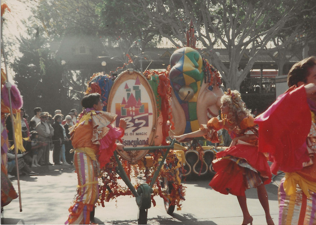 The color scheme for Party Gras was inspired by the 35 Years of Magic logo. (Or was it the other way around?)