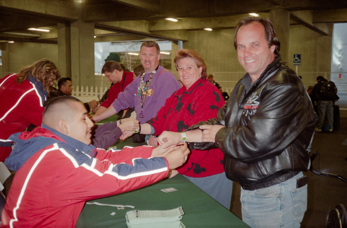 Steven W. Smith (right) receives the first wristband