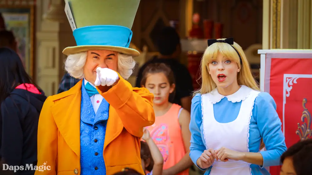 Caption of the Week – Week #6 – Mad Hatter and Alice in Wonderland