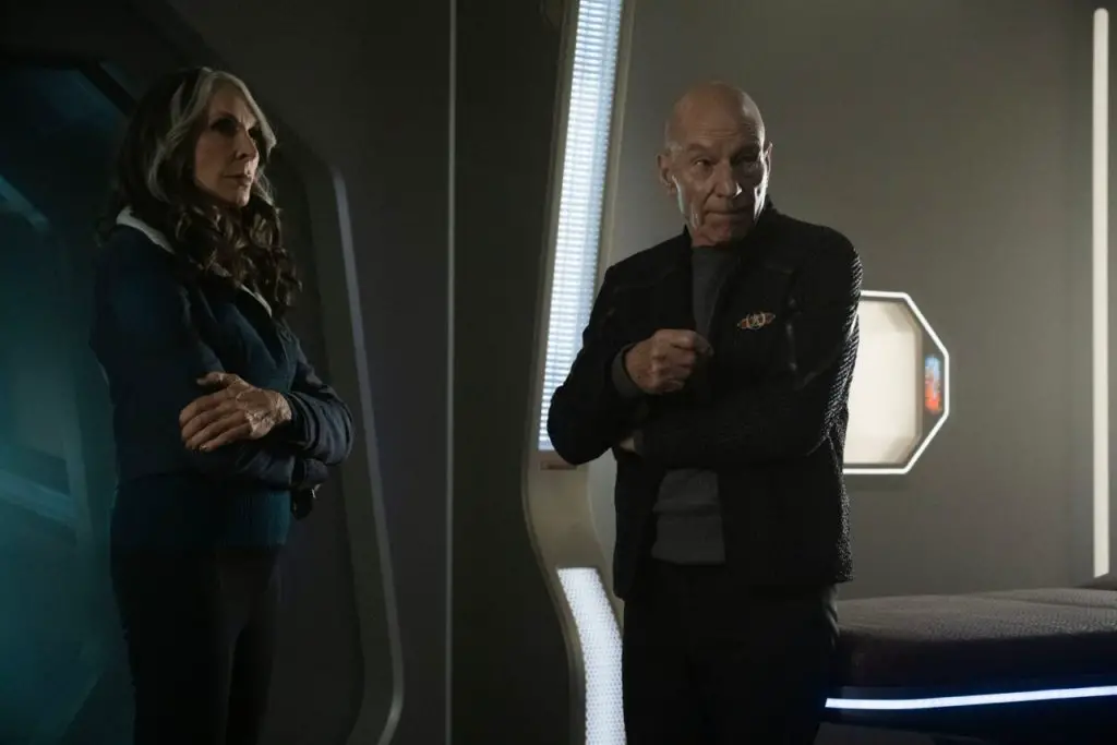 ates McFadden as Dr. Beverly Crusher and Patrick Stewart as Picard