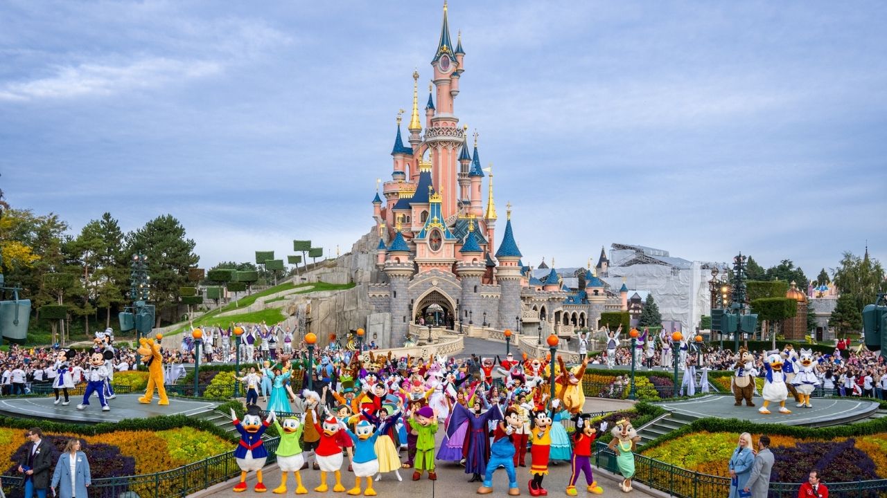 Disneyland Paris Celebrates Disney’s 100th Anniversary with 100 Disney Characters in Front of Sleeping Beauty Castle