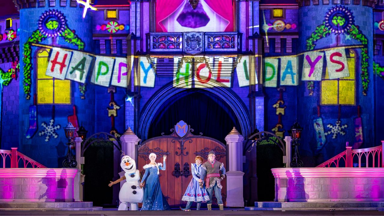Magic Kingdom’s Cinderella Castle Lights Up at Night During ‘Frozen Holiday Surprise’