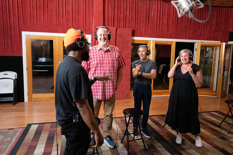 Musician PJ Morton at the piano recording the Tiana’s Bayou Adventure soundtrack