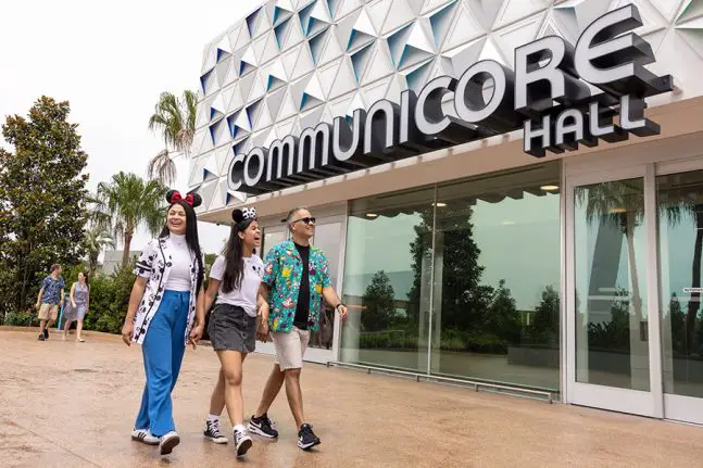Guests walking past the exterior of CommuniCore Hall