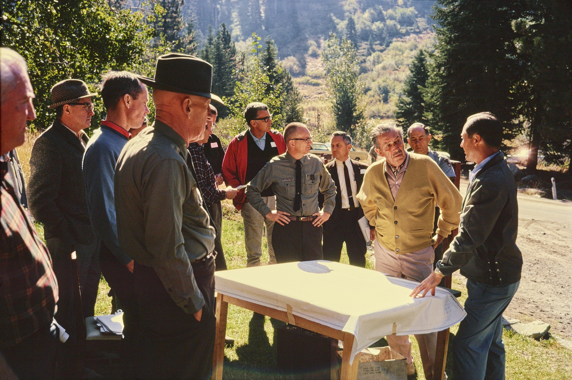 Walt Disney and Mineral King survey team, outdoors in historical photo