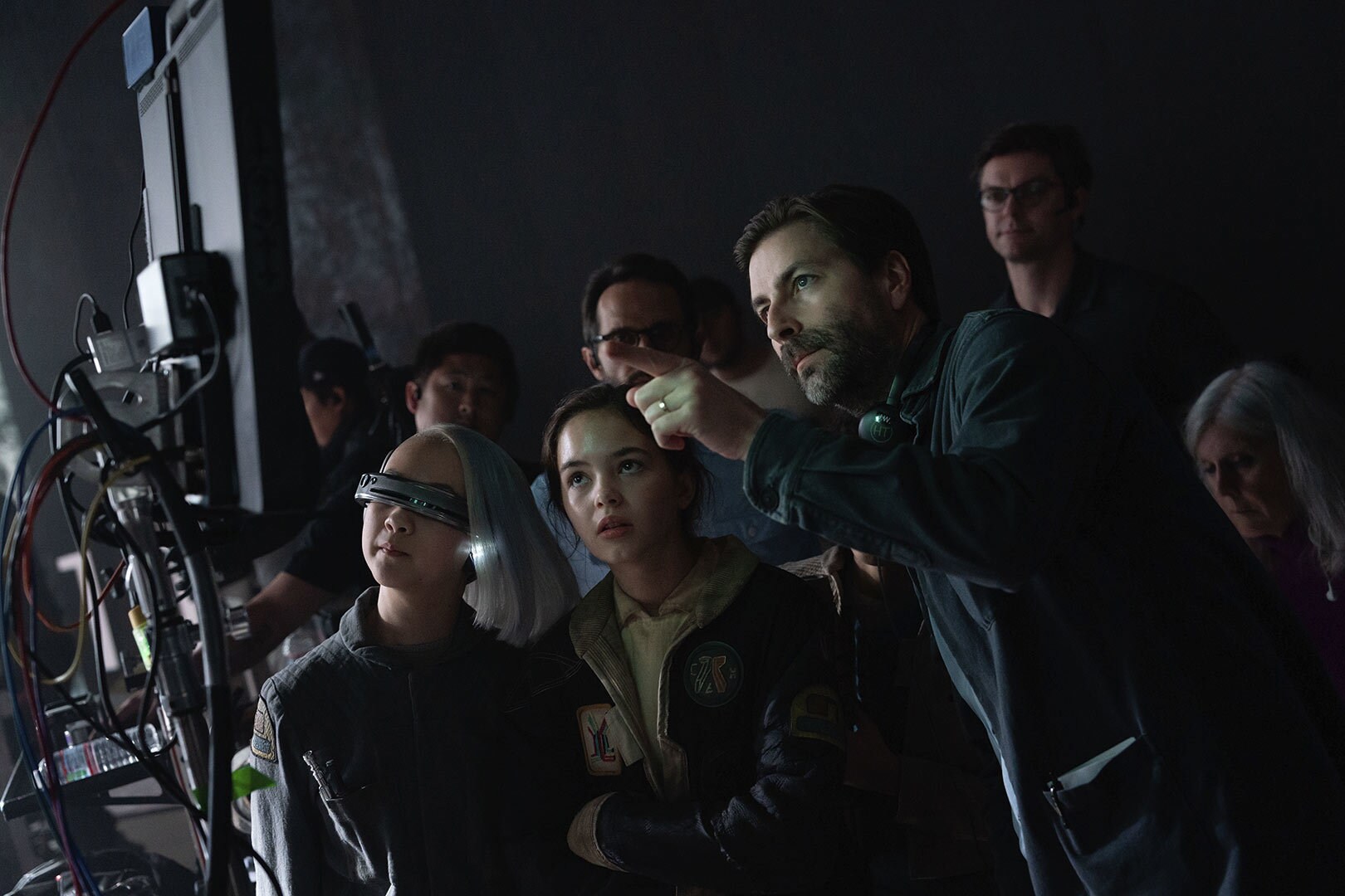 (L-R) Kyriana Kratter, Ryan Kiera Armstrong and Jon Watts on the set of Star Wars: Skeleton Crew.