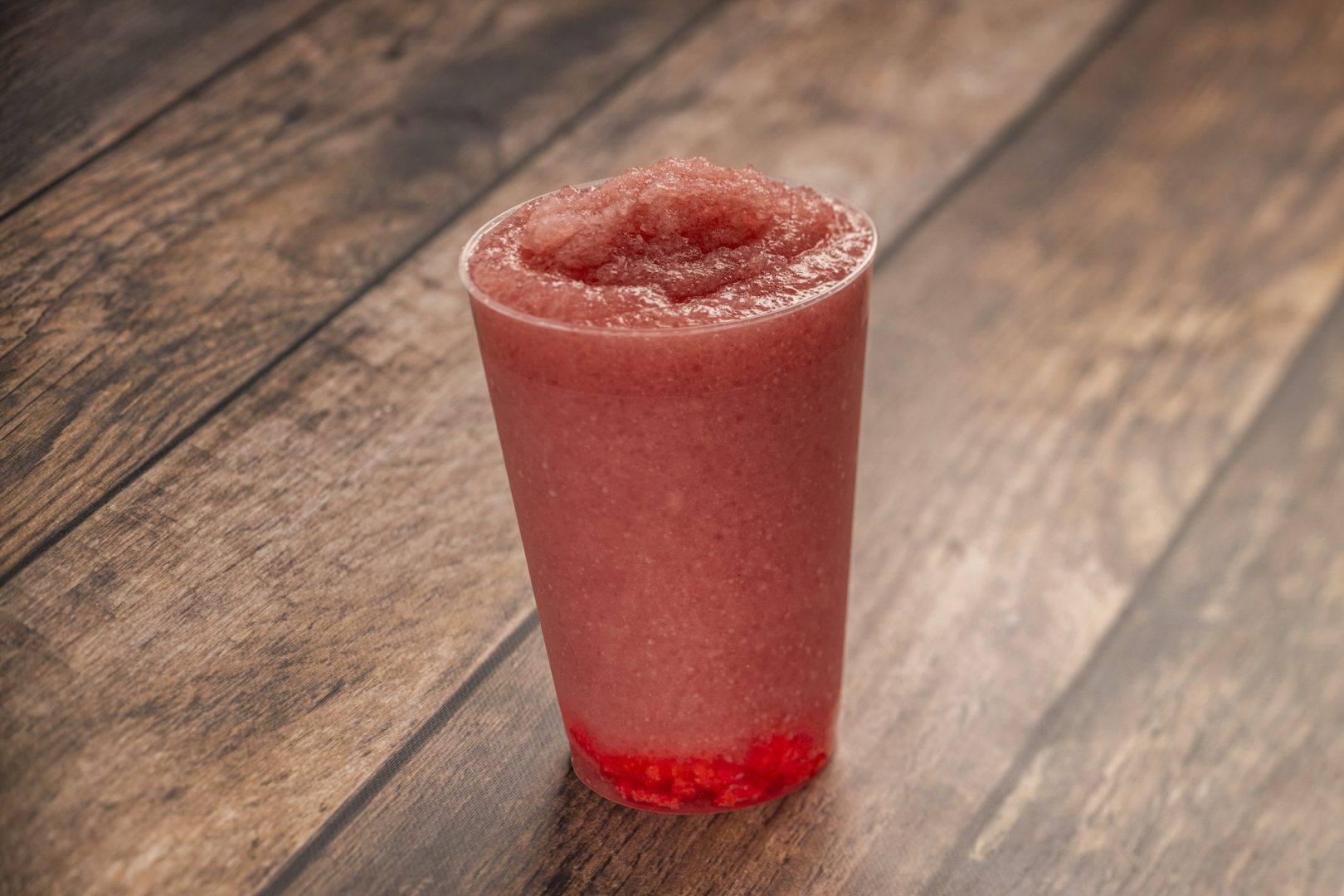 Frozen Wildberry Limeade: Minute Maid Limeade, Minute Maid Strawberry Smoothie, and wildberry syrup with popping candy (Non-alcoholic) (Spirited version available with Tito’s Handmade Vodka) (New)