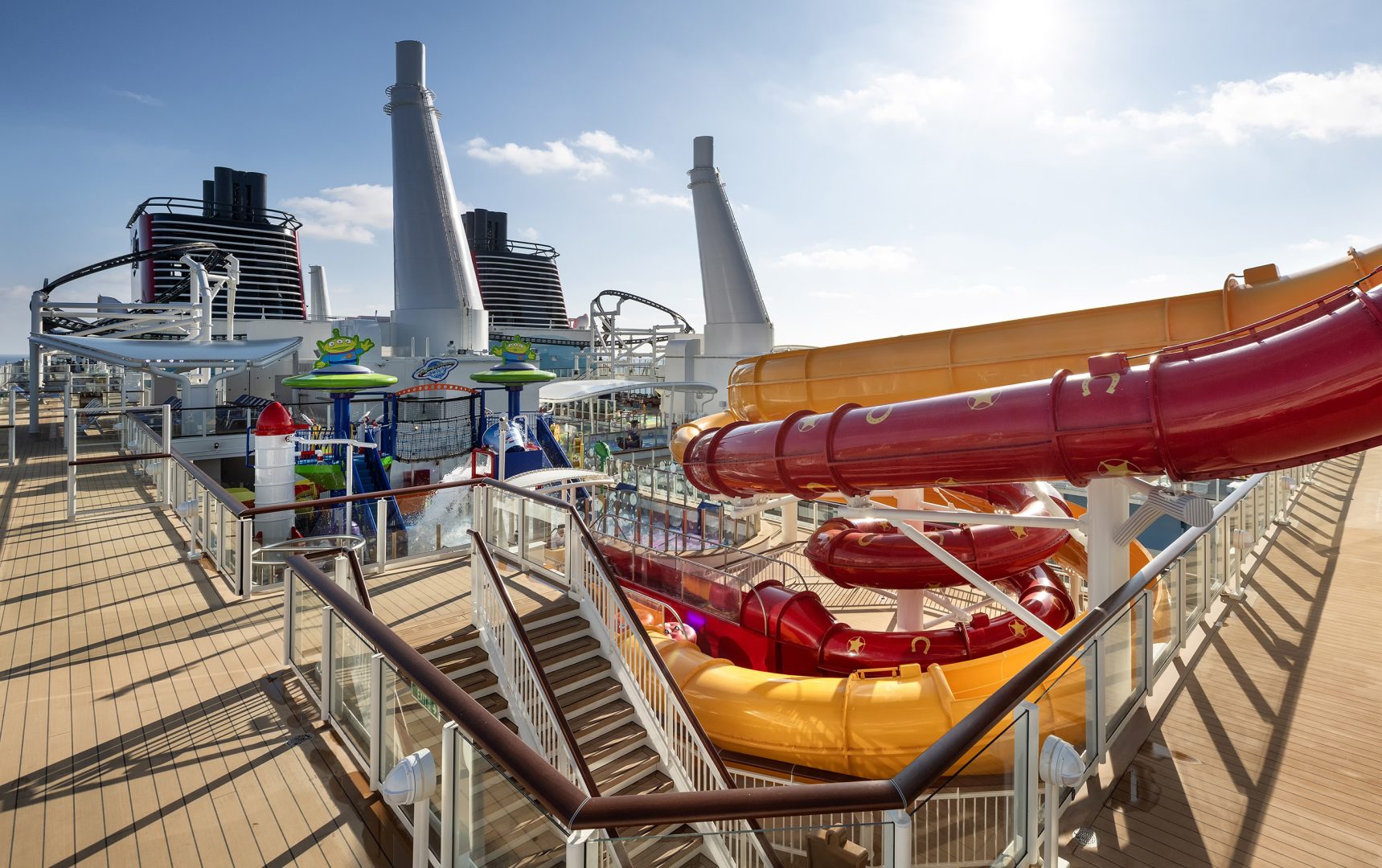 Woody and Jessie’s Wild Slides on the Disney Adventure feature the iconic bright red and yellow colors, sending guests twisting and turning down to a splash-tacular landing