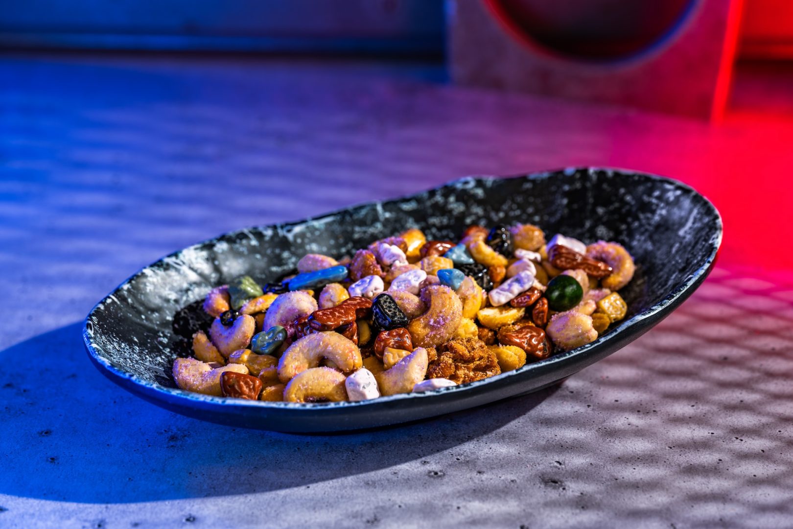 Ettel Nuts: Assortment of sweet, spicy, and queso fundido nuts with chocolate candy rocks​ (New)