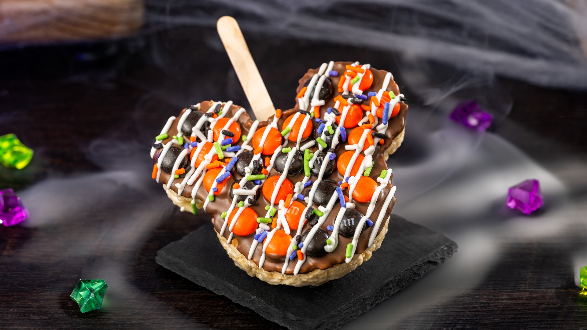 Mickey Halloween Cereal Treat with M&M’S Milk Chocolate Candies: Crisped rice cereal treat with milk chocolatey coating, M&M