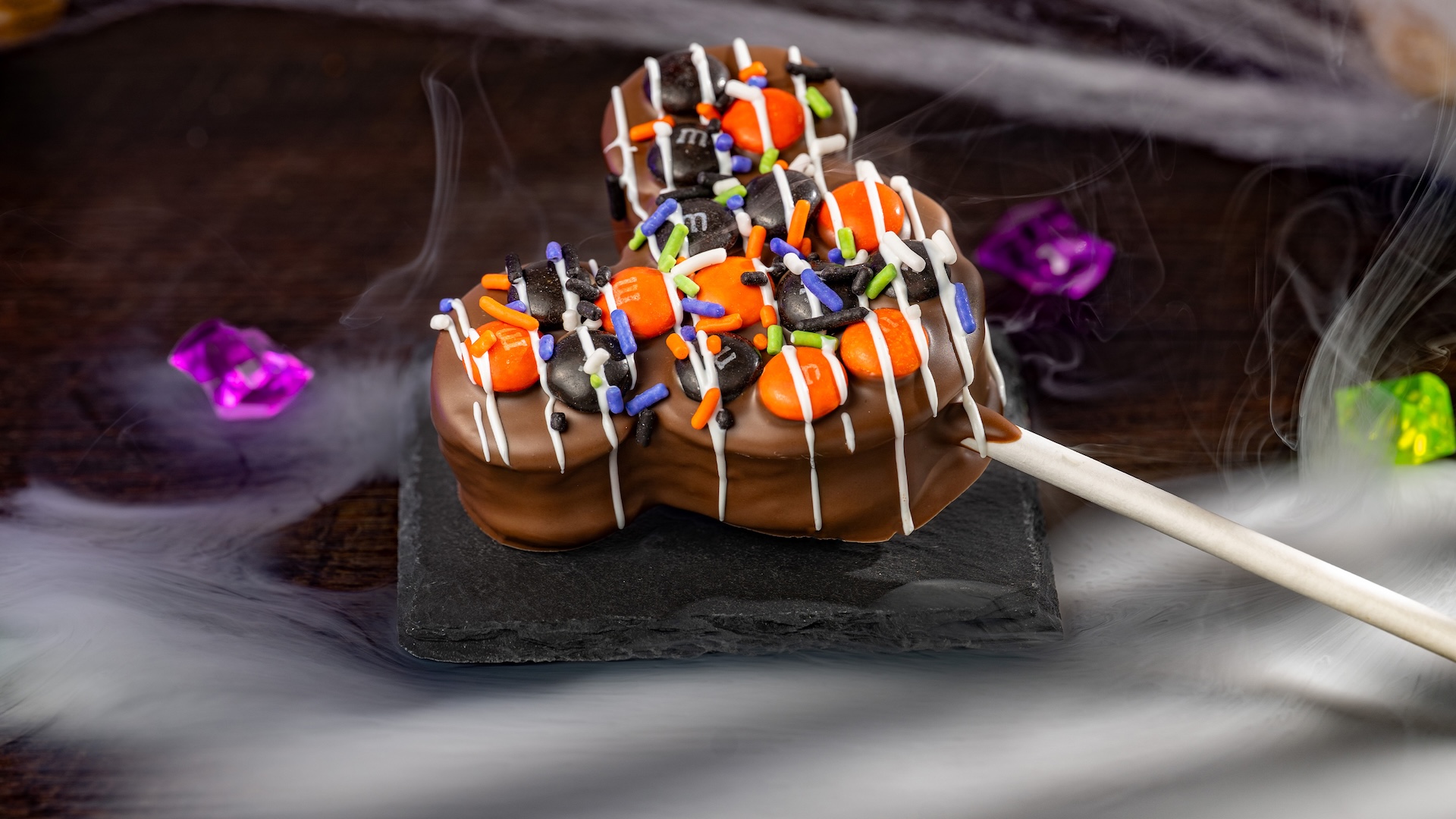 Mickey Halloween Marshmallow Pop with M&M’S Milk Chocolate Candies: Marshmallow with milk chocolatey coating, M&M