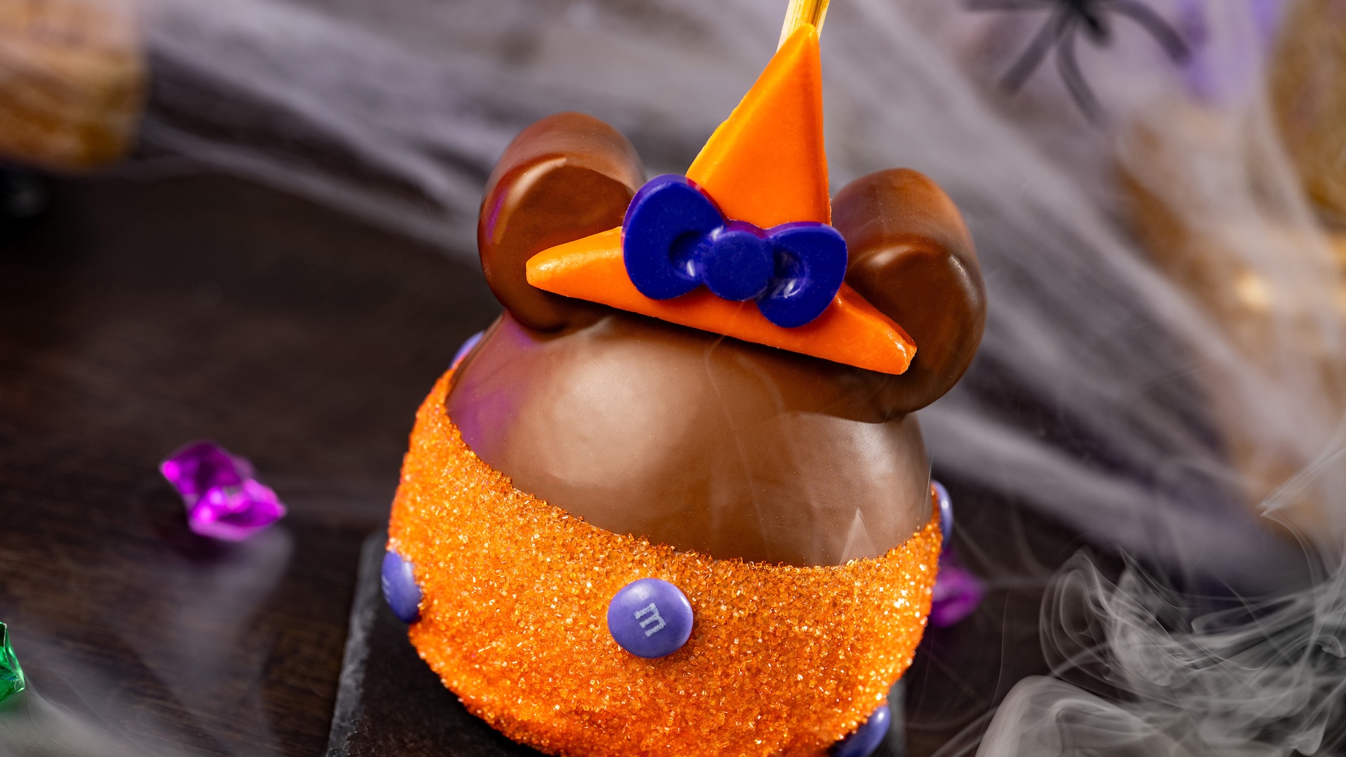 Minnie Witch Caramel Apple with M&M’S Milk Chocolate Candies: Granny Smith apple with marshmallow ears dipped in Werther’s Original caramel and milk chocolatey coating with M&M