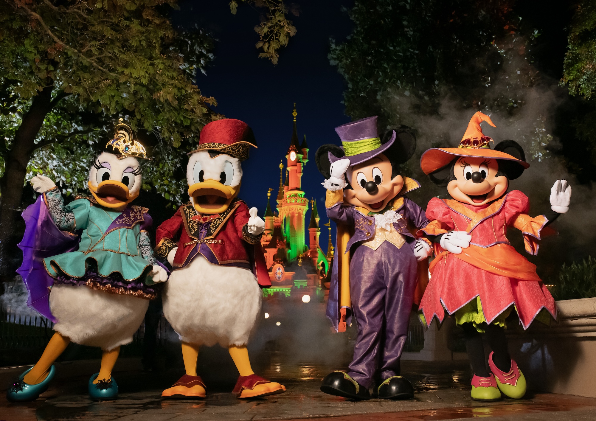 Mickey and his friends in Victorian-style Halloween attire