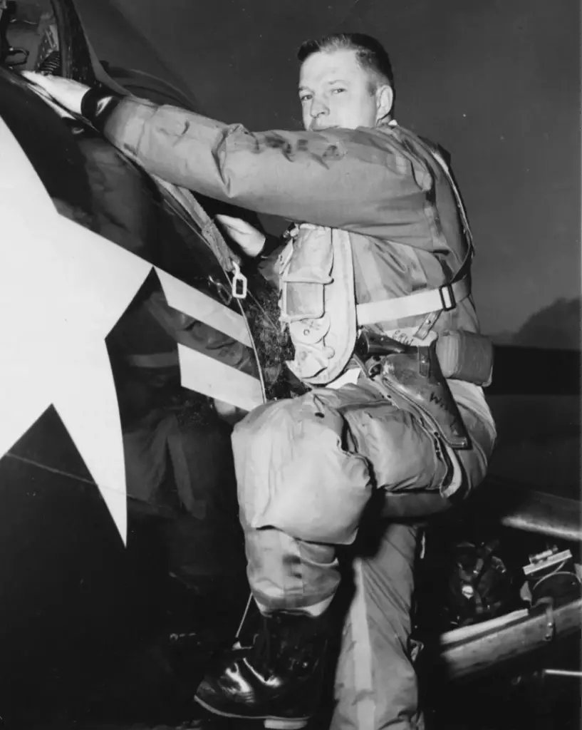 Photo from Royce’s time in the U.S. Navy and aboard his aircraft the Navy F9F-2 Panther in 1952 (Photo courtesy of Royce Williams).